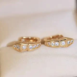 Bvlgari snake stud earrings. Paying tribute to the Serpenti animal