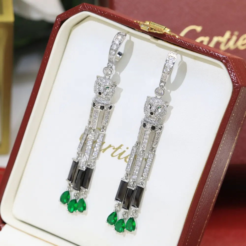 Cartier colored diamond tassel leopard stud earrings are out Celebrity style