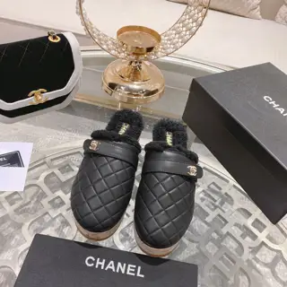Chanel’s popular all-leather slippers