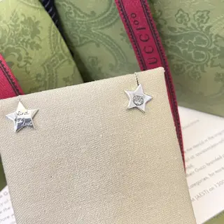 Gucci five-pointed star cat head letter earrings