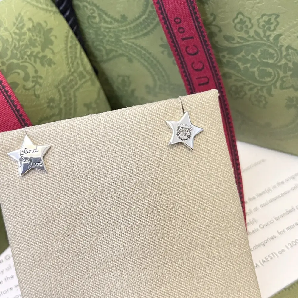 Gucci five-pointed star cat head letter earrings