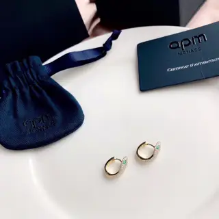 Apm monaco gold and silver snake-shaped earrings