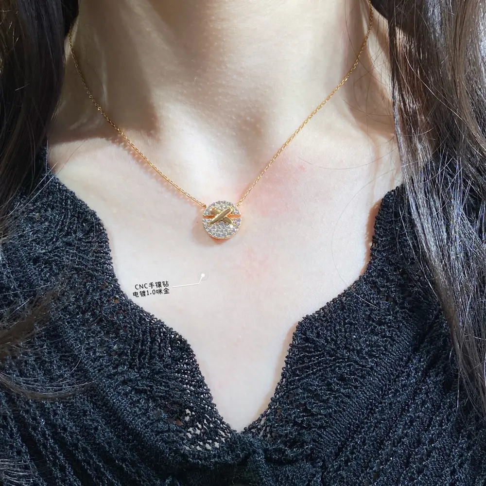 Chaumet cross round diamond necklace