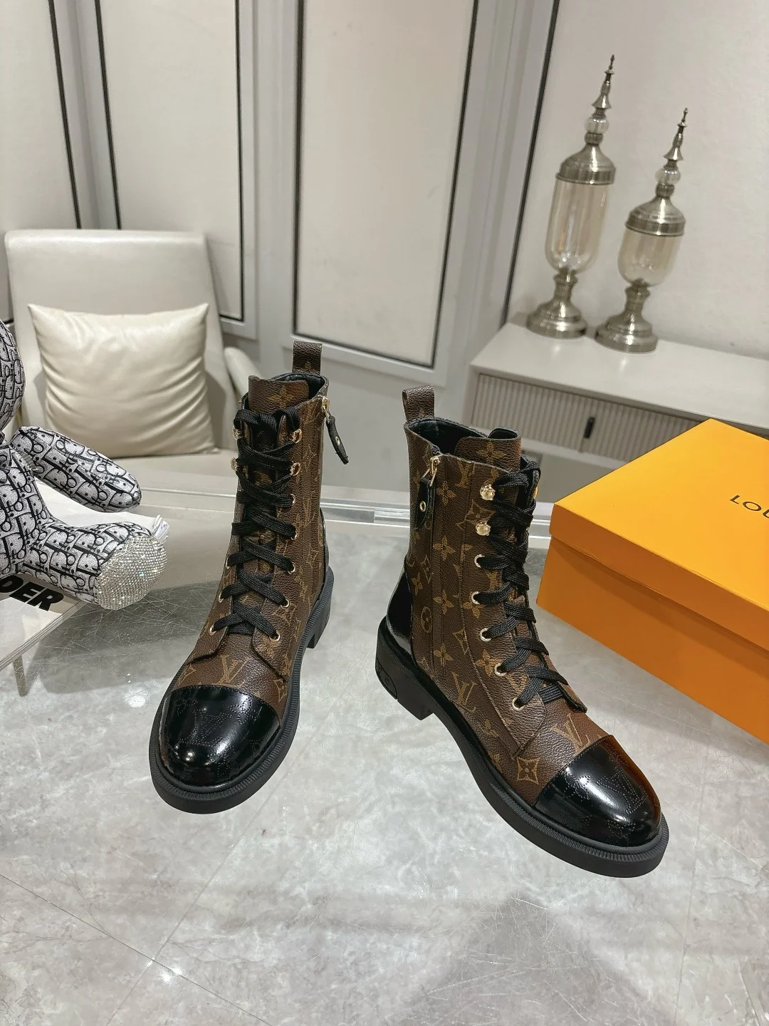 Louis Vuitton x Timberland co-branded boots with yellow florals