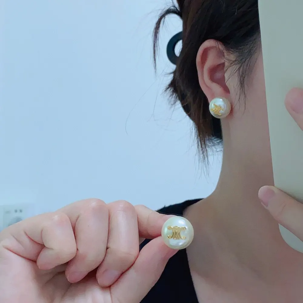 Celine Arc de Triomphe pearl white earrings