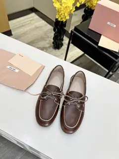 Miu Miu Miu’s rubbed retro loafers are hot