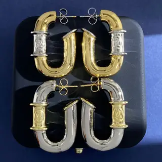 Louis Vuitton metallic gold and silver contrast earrings