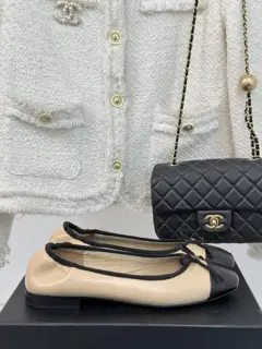 Chanel’s timeless classic color-blocked bow ballet shoes