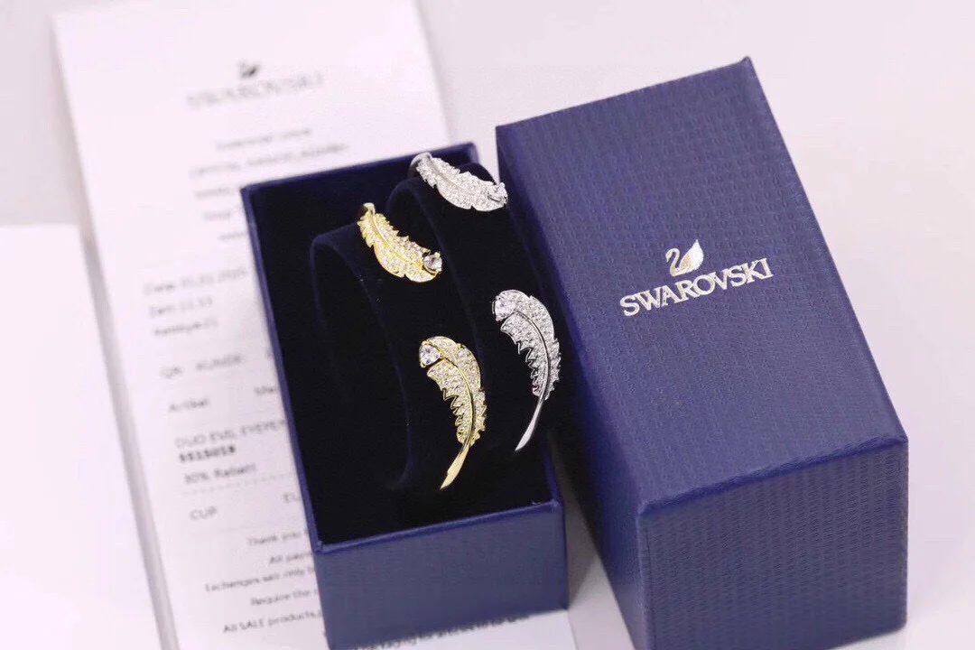 Swarovski gold and silver feather open bracelet