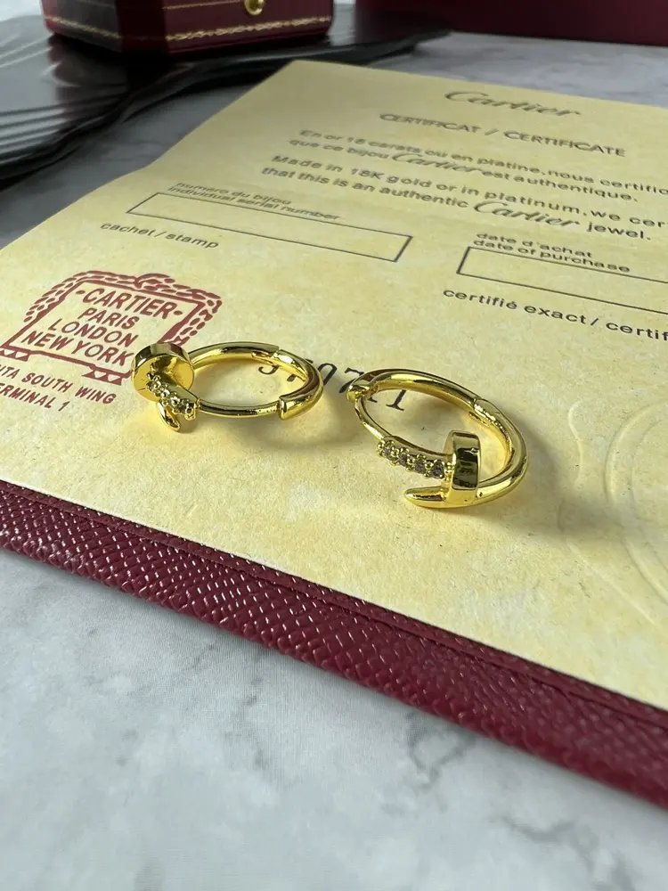 Cartier nail earrings