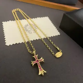 Chrome Hearts cross pink diamond pendant and yellow gold necklace
