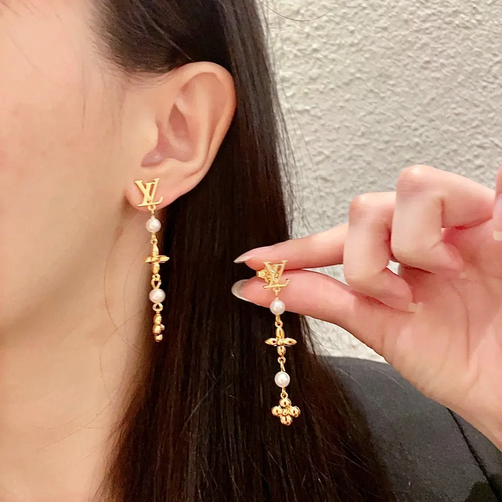 Louis Vuitton vintage LV letter earrings