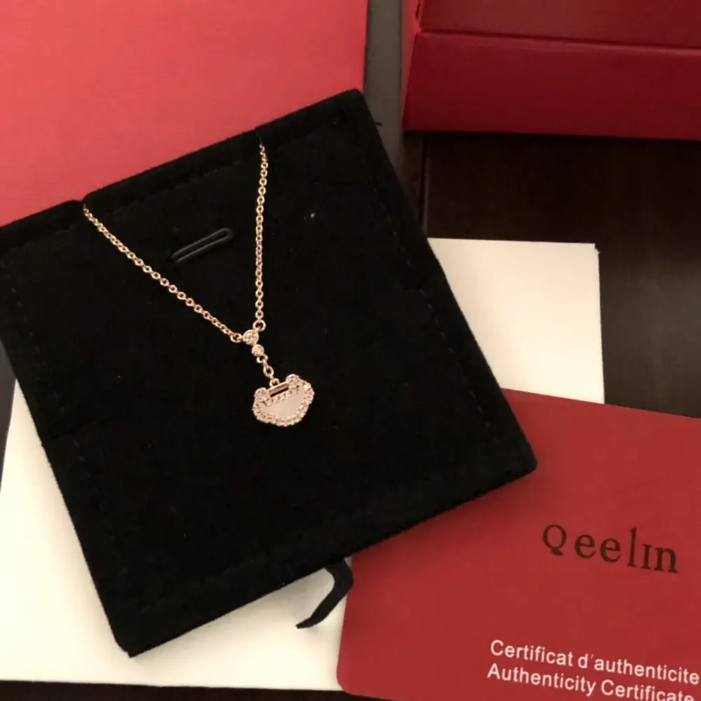 Qeelin diamond-studded Ruyi lock necklace