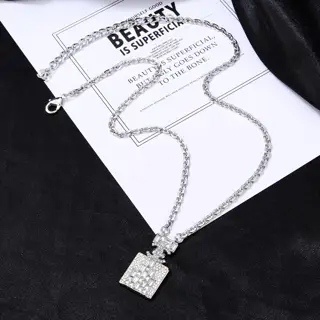 Chanel perfume bottle diamond double C necklace