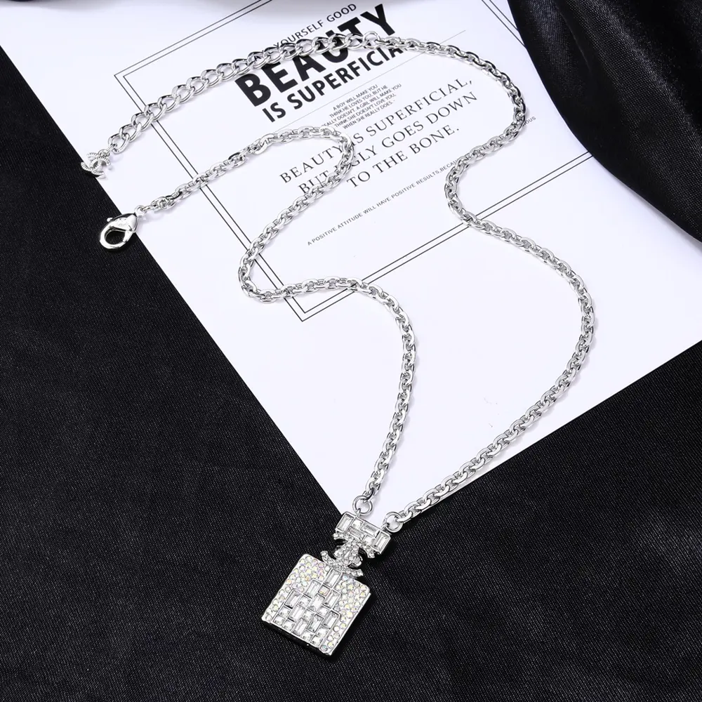 Chanel perfume bottle diamond double C necklace