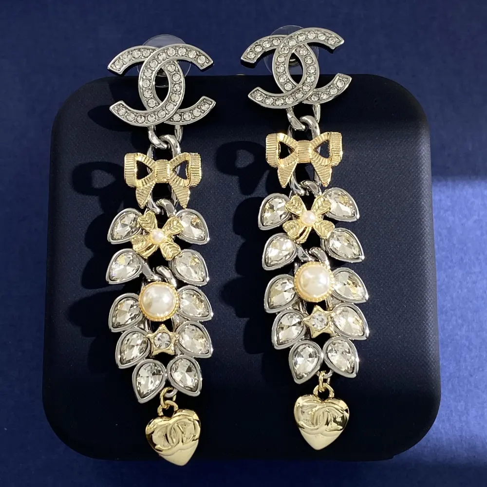 Chanel diamond-studded double C letter bow