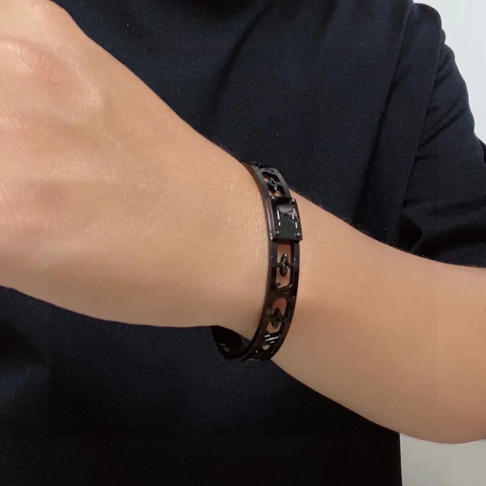 Louis Vuitton Unisex Carved Hollow Letter Black Warrior Bracelet 21cm Large Size