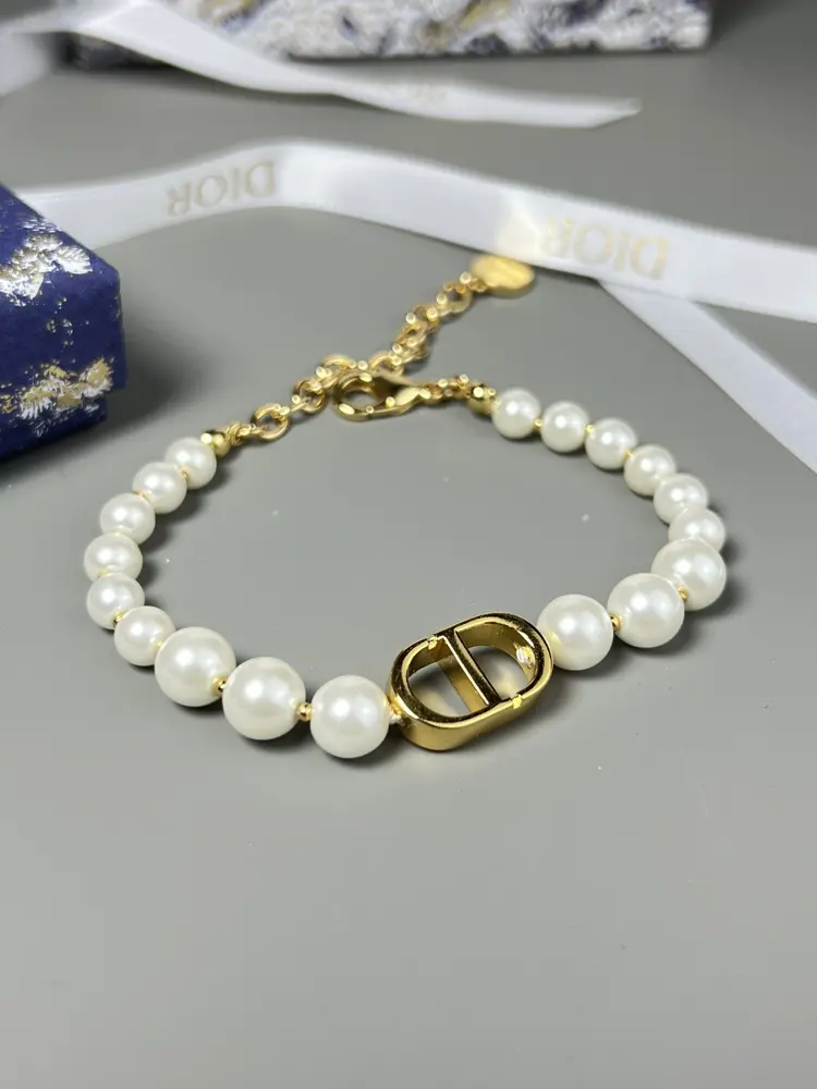 Dior bracelets reinterpret the House’s classic design with a modern twist. Made from white