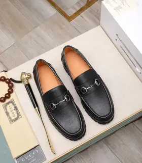 Gucci metal buckle loafers