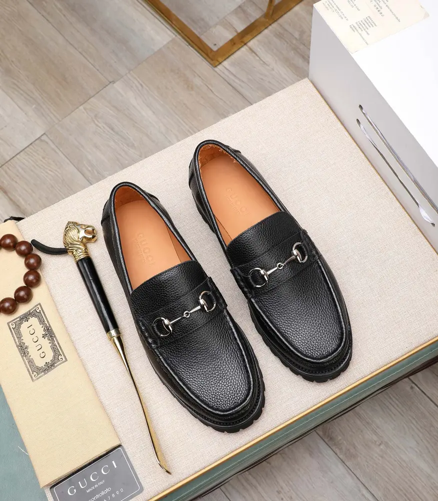 Gucci metal buckle loafers