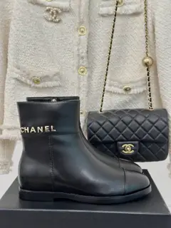 Chanel lettered height-enhancing boots series