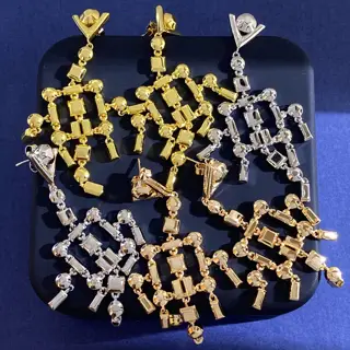 Louis Vuitton long earrings in geometric metal