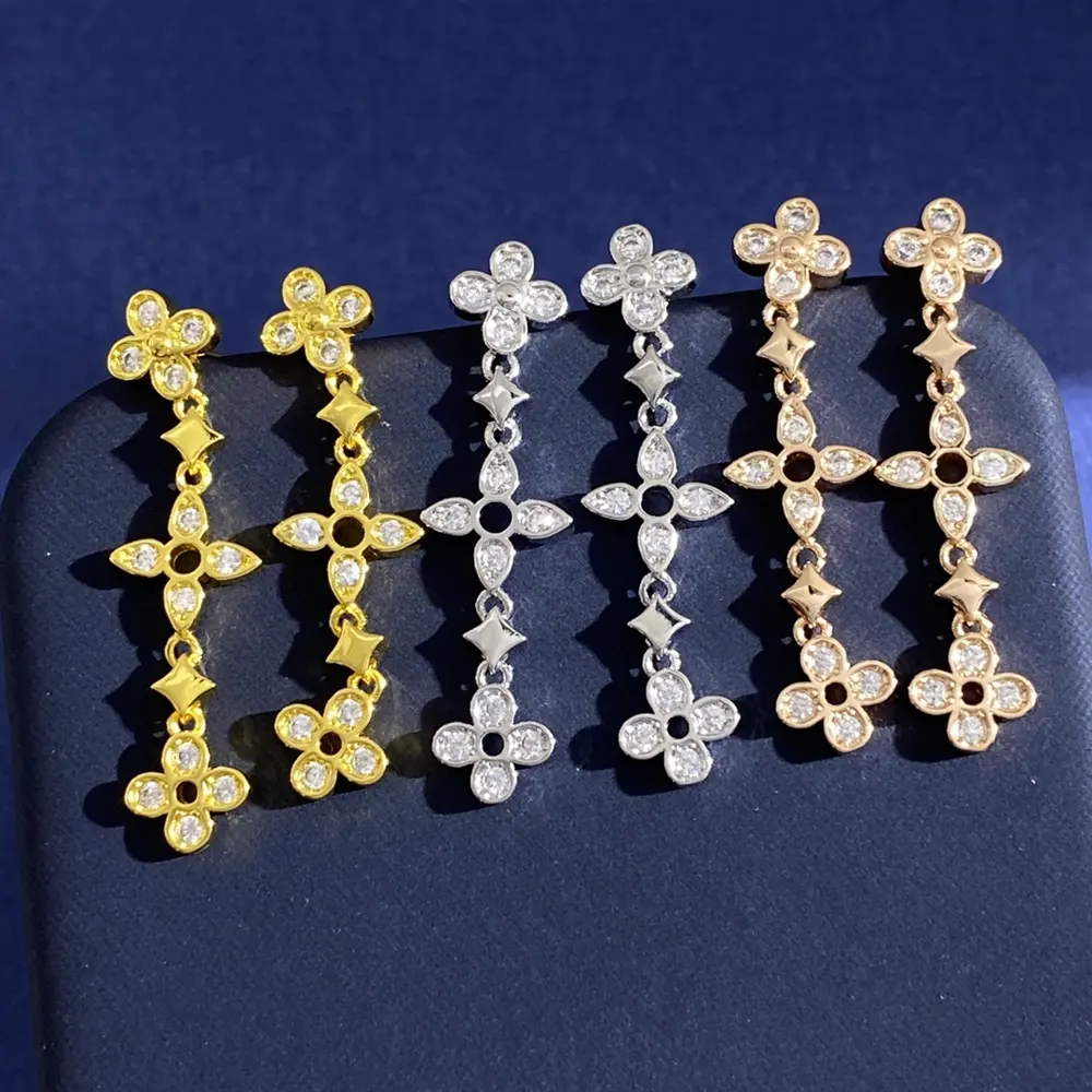 Louis Vuitton diamond-encrusted monogram rhombus cross-shaped four-leaf clover tassel long