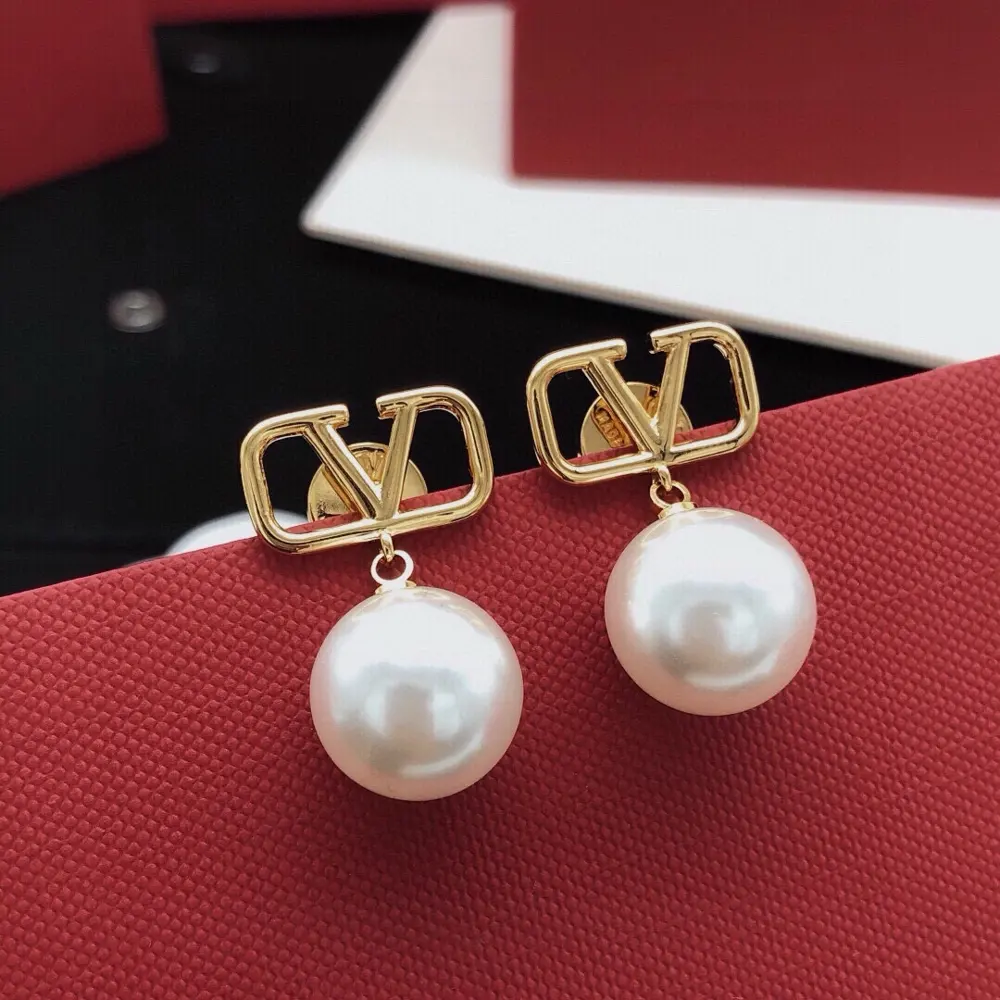 Valentino V-shaped earrings with pearls