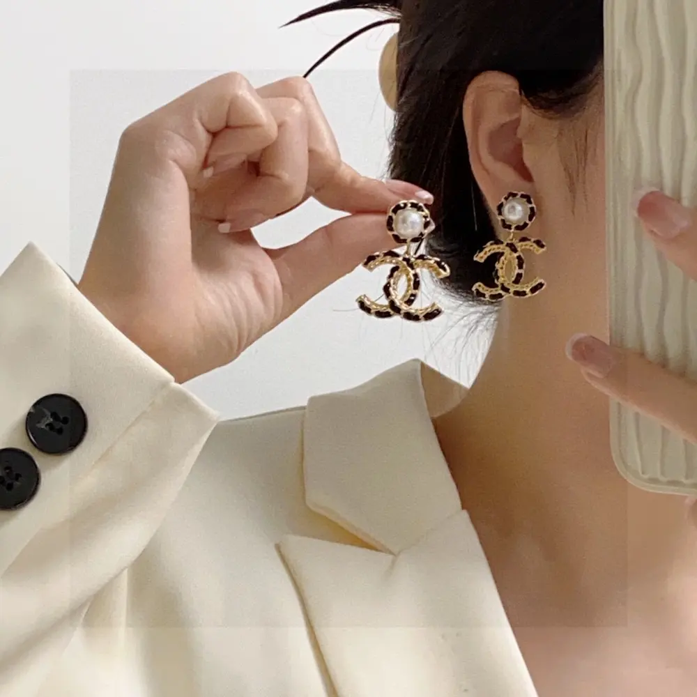 Chanel black leather drop earrings