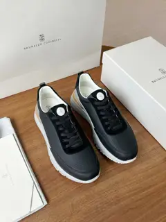 Brunello Cucinelli color-blocked sports flats for men. This pair of flat sports shoes
