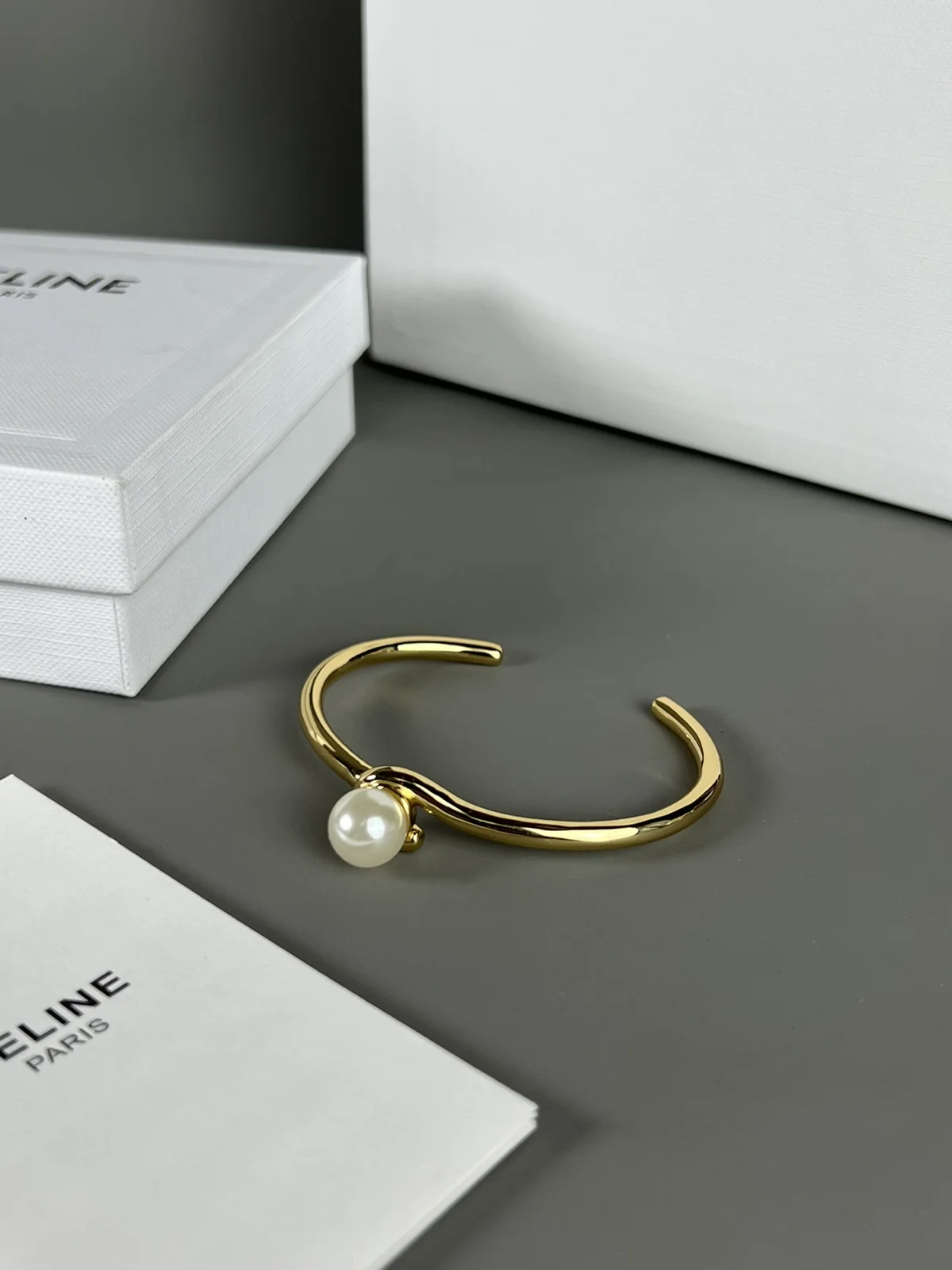 Celine twisted bracelet is very textured when worn. The simple design is engraved with