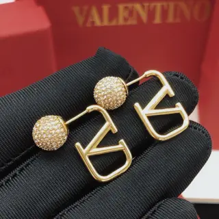 Valentino earrings glossy gold ball plugs