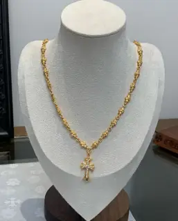Chrome Hearts gold cross necklace