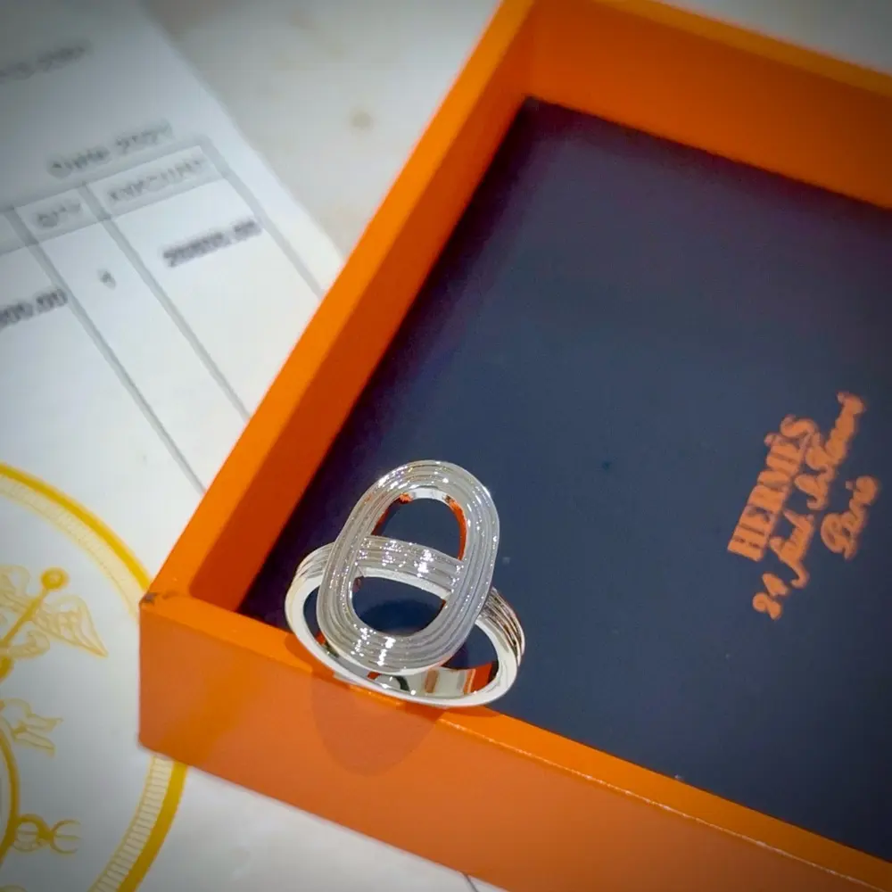 Both men and women can wear it. Classic Hermès ring. High-end and classy. Pig nose ring The