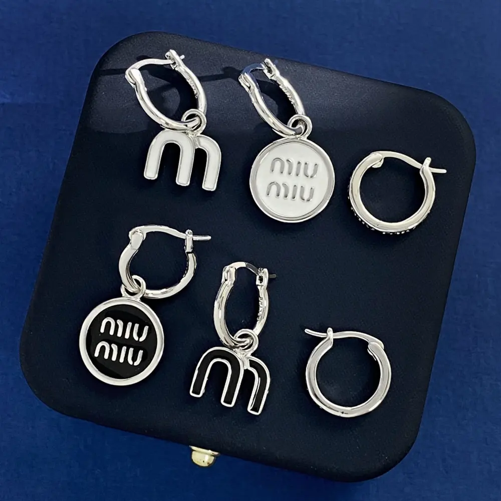miumiu Korean version all-match white and black oil drop M letter round AB with