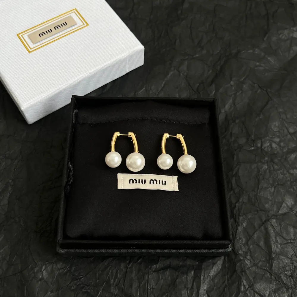 Miu Miu Miu pearl earrings