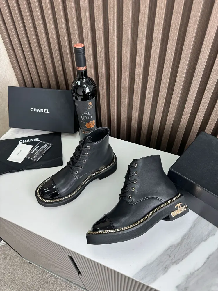 Chanel short boots with gold hardware buckle and chain