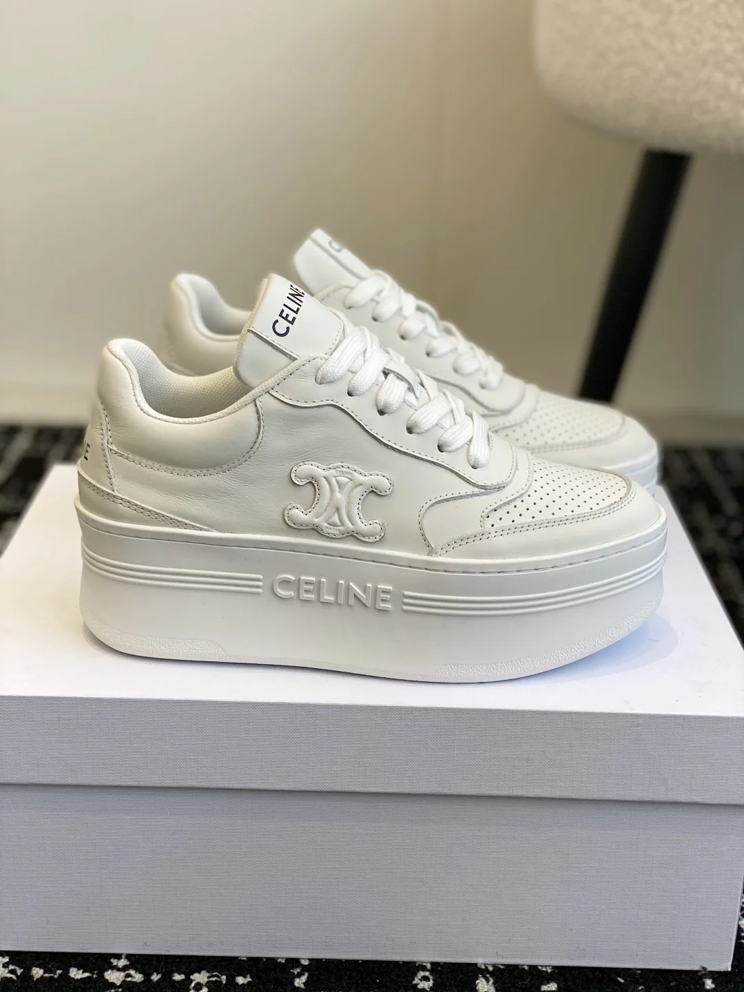 Celine thick-soled white shoes with CELINE logo embossed on the back and sides