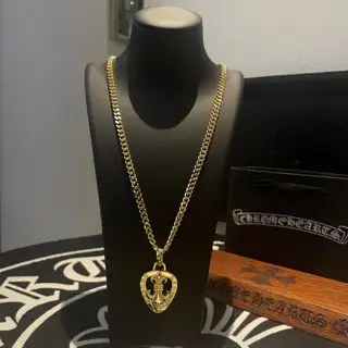 Chrome Hearts classic gold necklace with heart-shaped Scout flower pendant