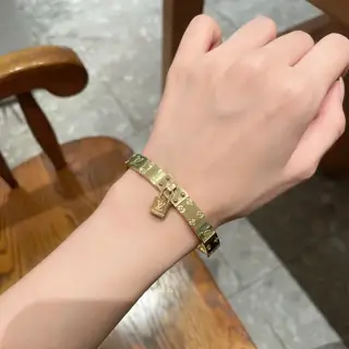 Louis Vuitton monogram lock engraved bracelet