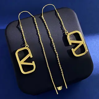 Valentino glossy V letter long chain tassel earrings