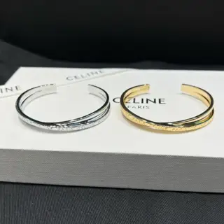 Celine double-ring bracelet with carved letters