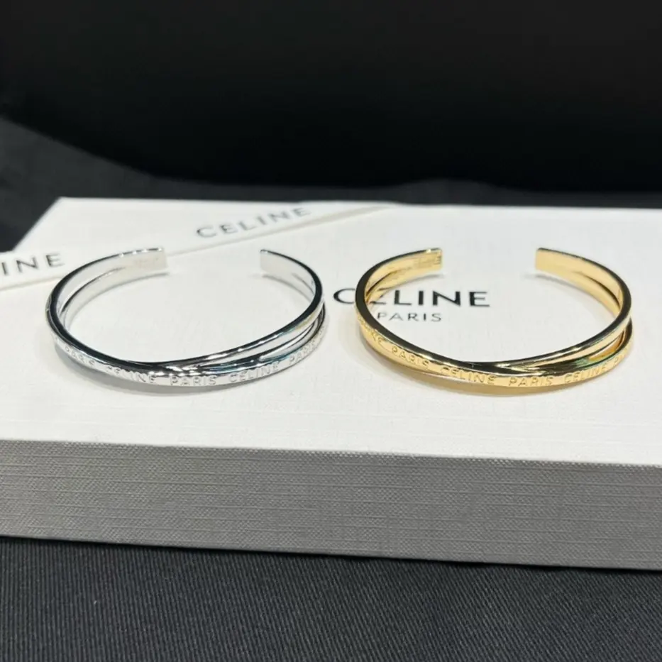 Celine double-ring bracelet with carved letters