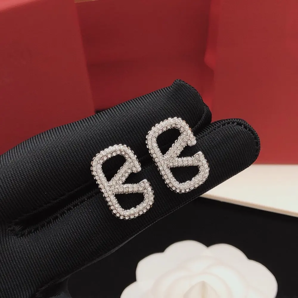 Valentino V-shaped diamond-encrusted silver earrings