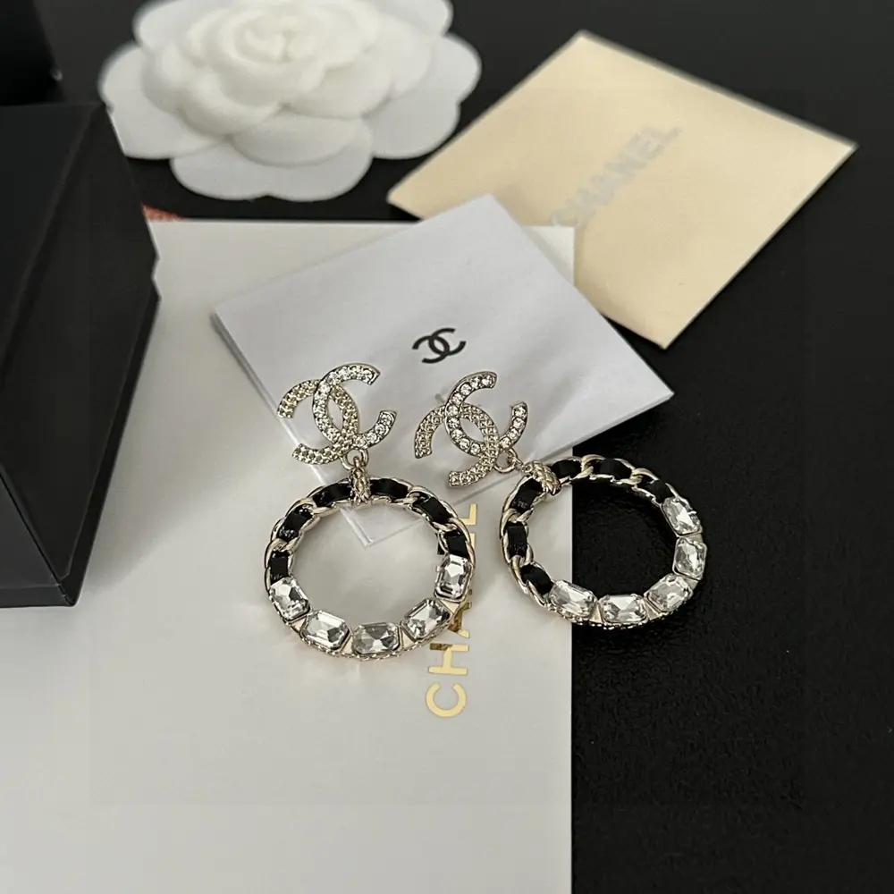 Chanel Swarovski crystal diamond leather string hoop letter earrings