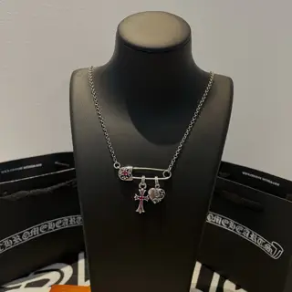 Chrome Hearts classic ten-paper clip cross love necklace. The concave and convex shapes