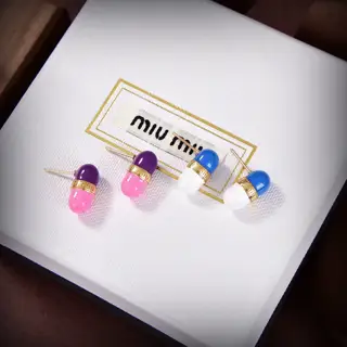 Miumiu’s latest pill earrings from the Paris show