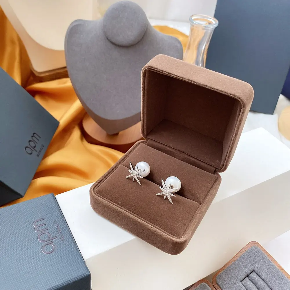 Apm monaco six-pointed star pearl earrings