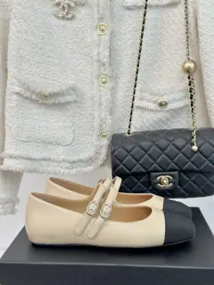 Chanel’s timeless classic color-blocked double-strap Mary Jane shoes