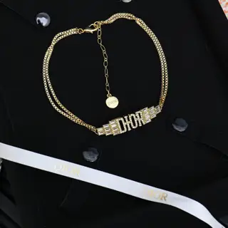 Dior’s heavy-duty step-cut diamond letter necklace is stunning